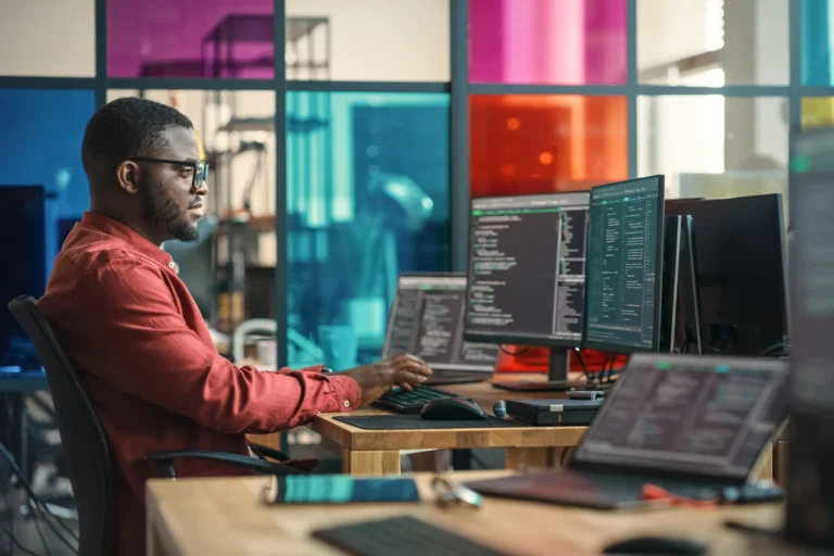 computer-engineer-at-desk-in-modern-office